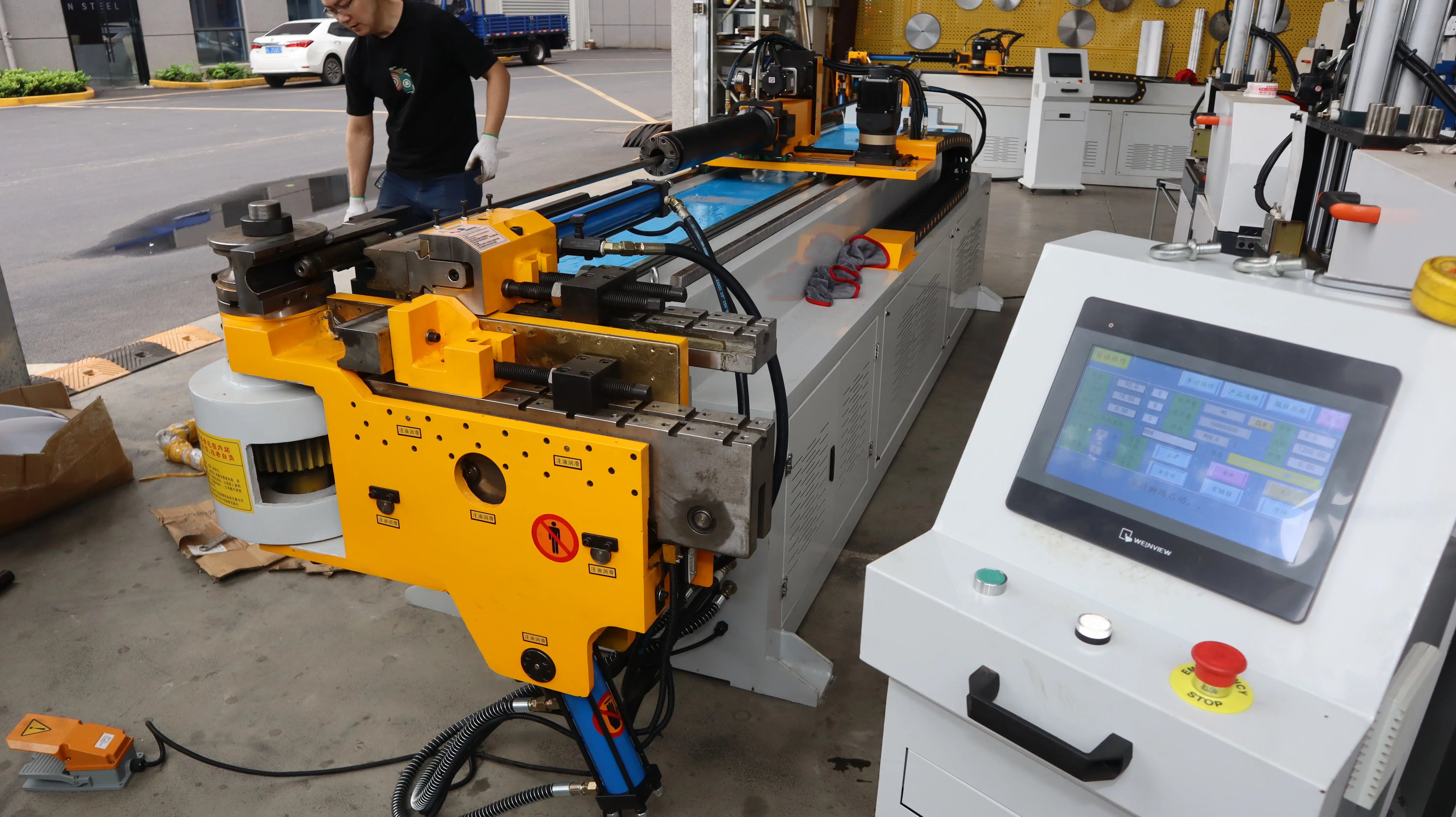 High precision servo feeding system on a CNC operation pipe bending machine for accurate tube positioning